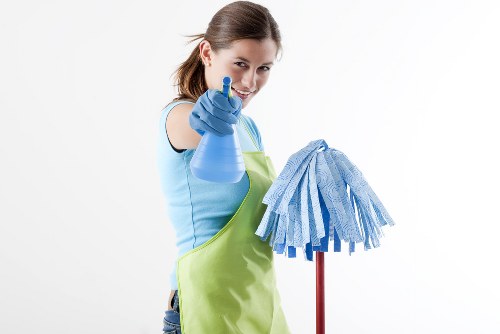 Curtain cleaning in a bright living room with fresh drapes