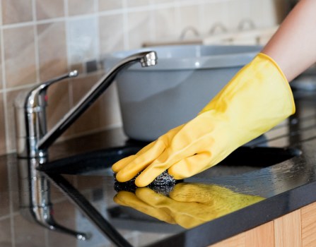 Hard surface stain removal on a countertop and tile area