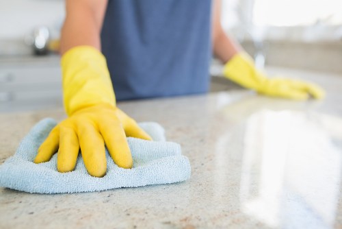 Carpet cleaning equipment removing dirt from floor fibers